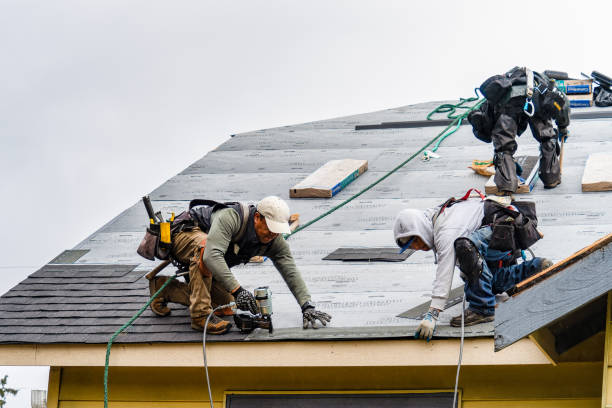 Professional Roofing technician working in Utica, NY